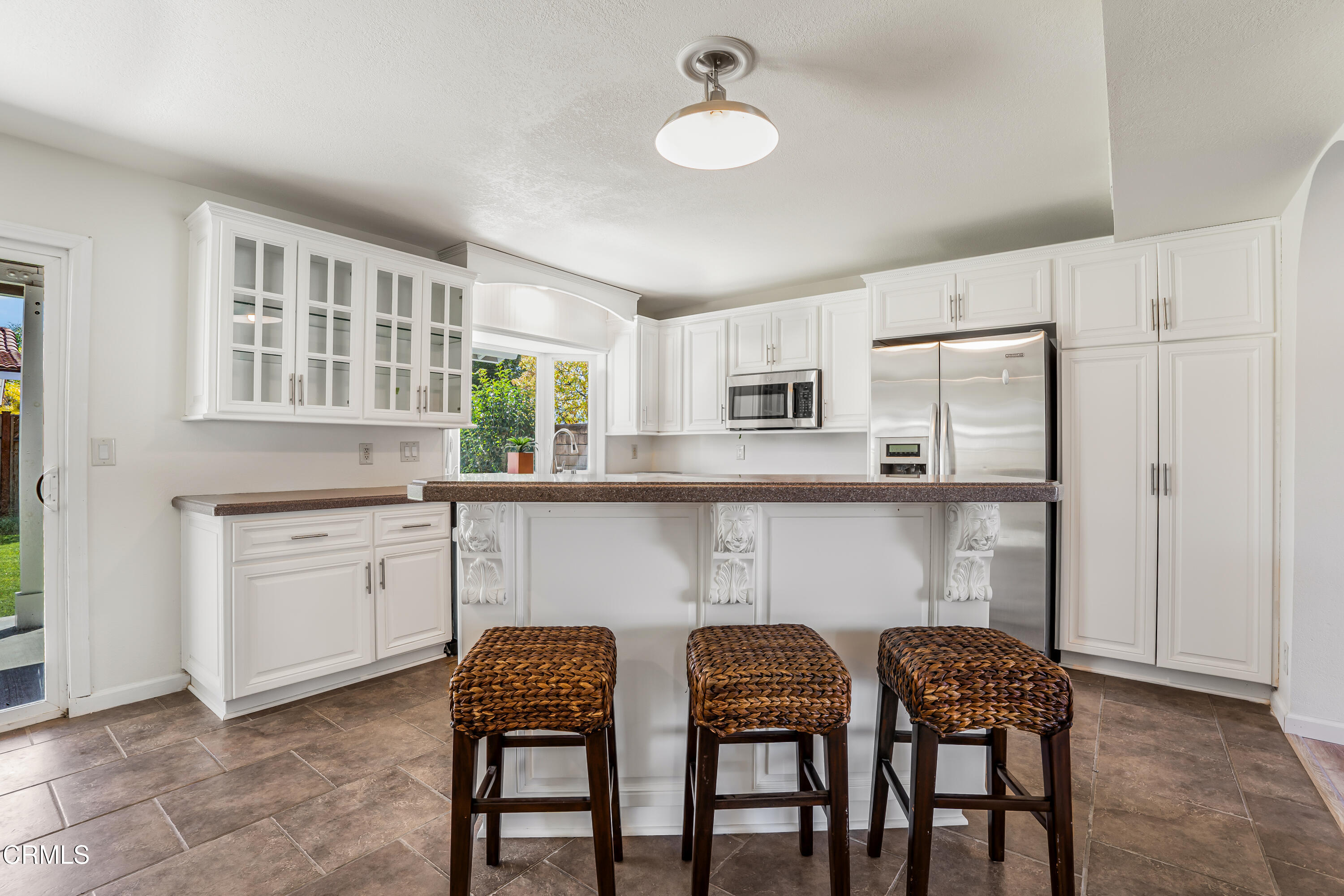734 Balden Lane Fillmore, CA 93015 - Photo 11 of 46 a kitchen with granite countertop white cabinets and stainless steel appliances