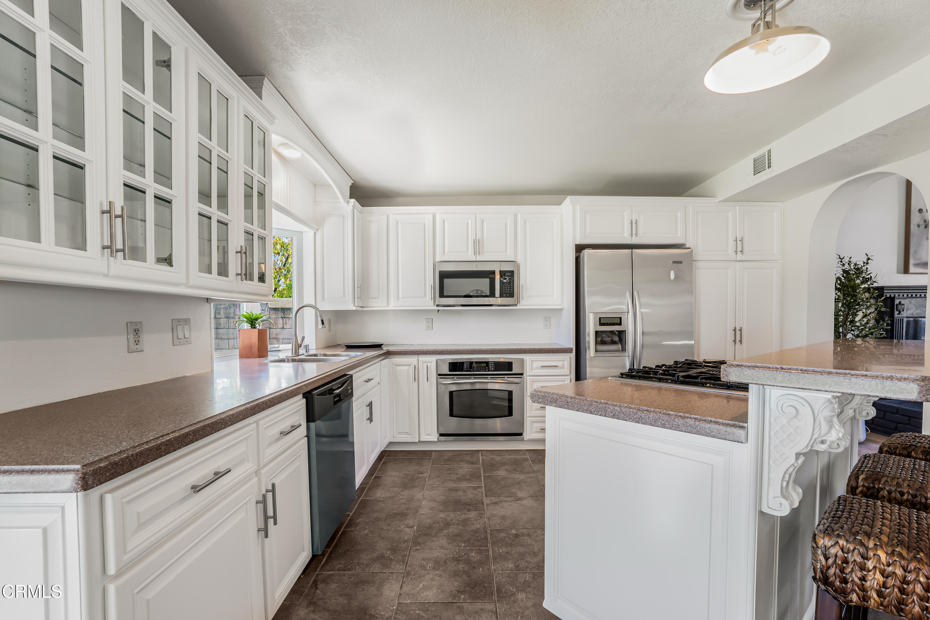734 Balden Lane Fillmore, CA 93015 - Photo 12 of 46 a kitchen with cabinets appliances a sink and a counter top space