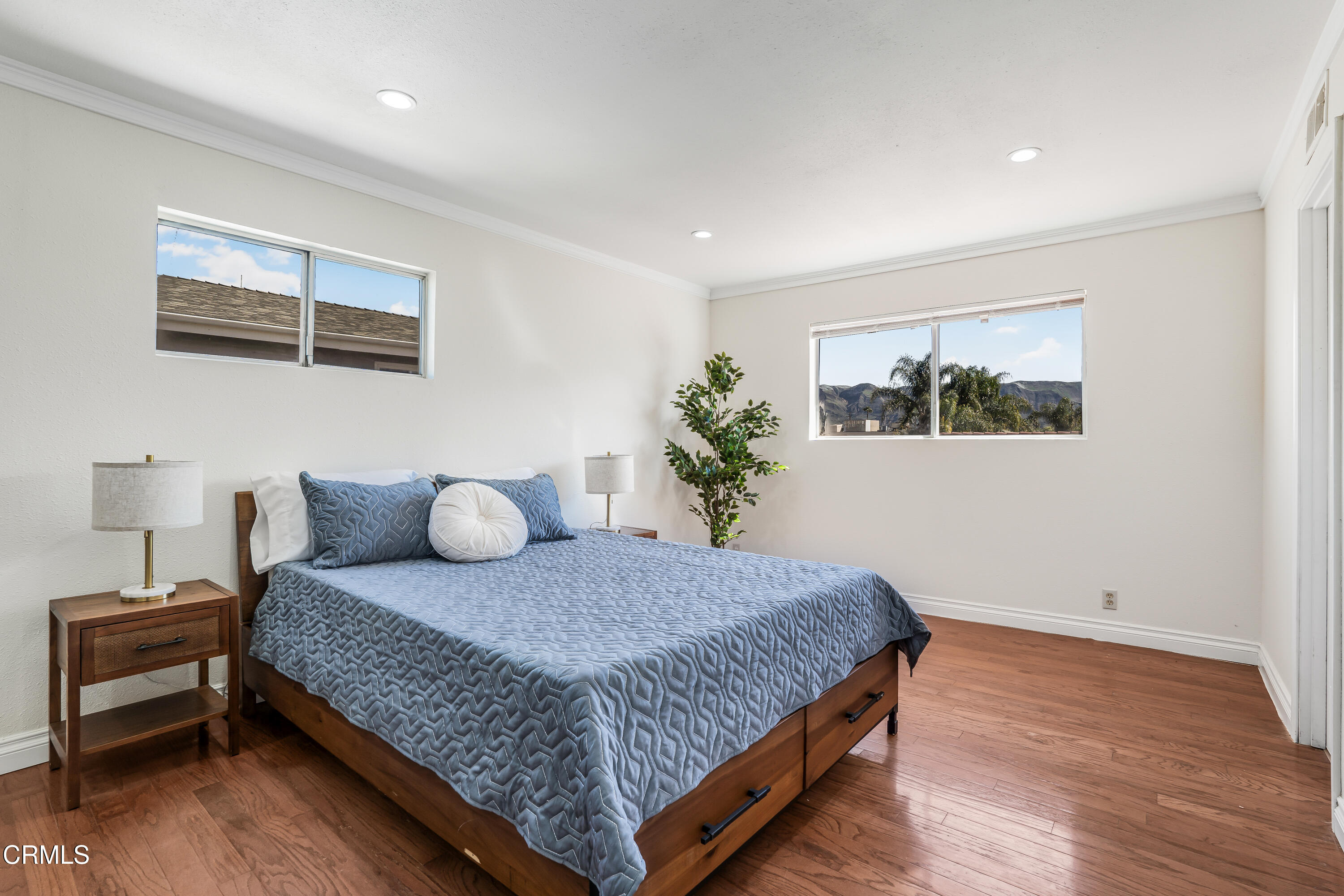 734 Balden Lane Fillmore, CA 93015 - Photo 14 of 46 a bedroom with a large bed and a night stand