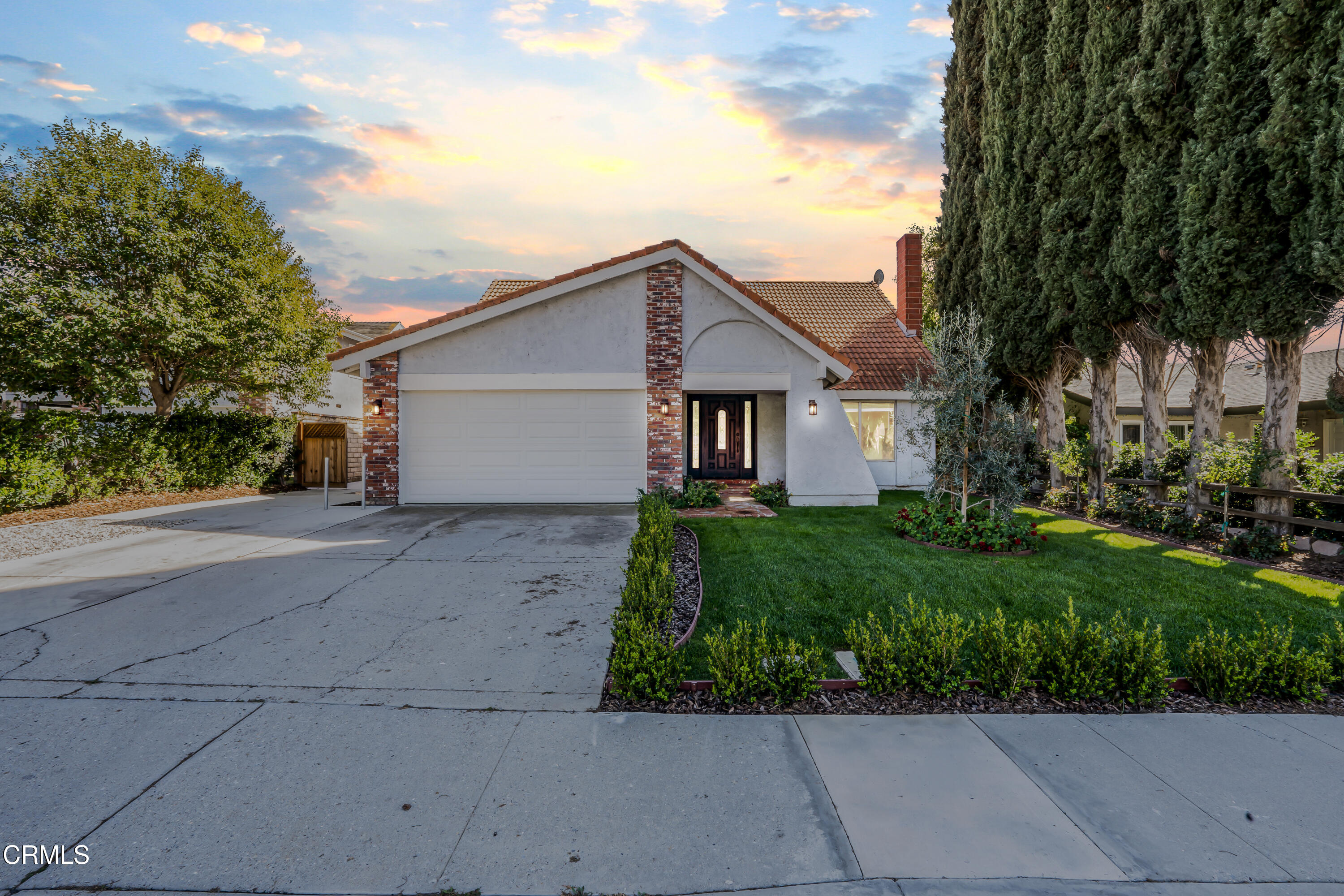 734 Balden Lane Fillmore, CA 93015 - Photo 2 of 46 a front view of a house with a yard
