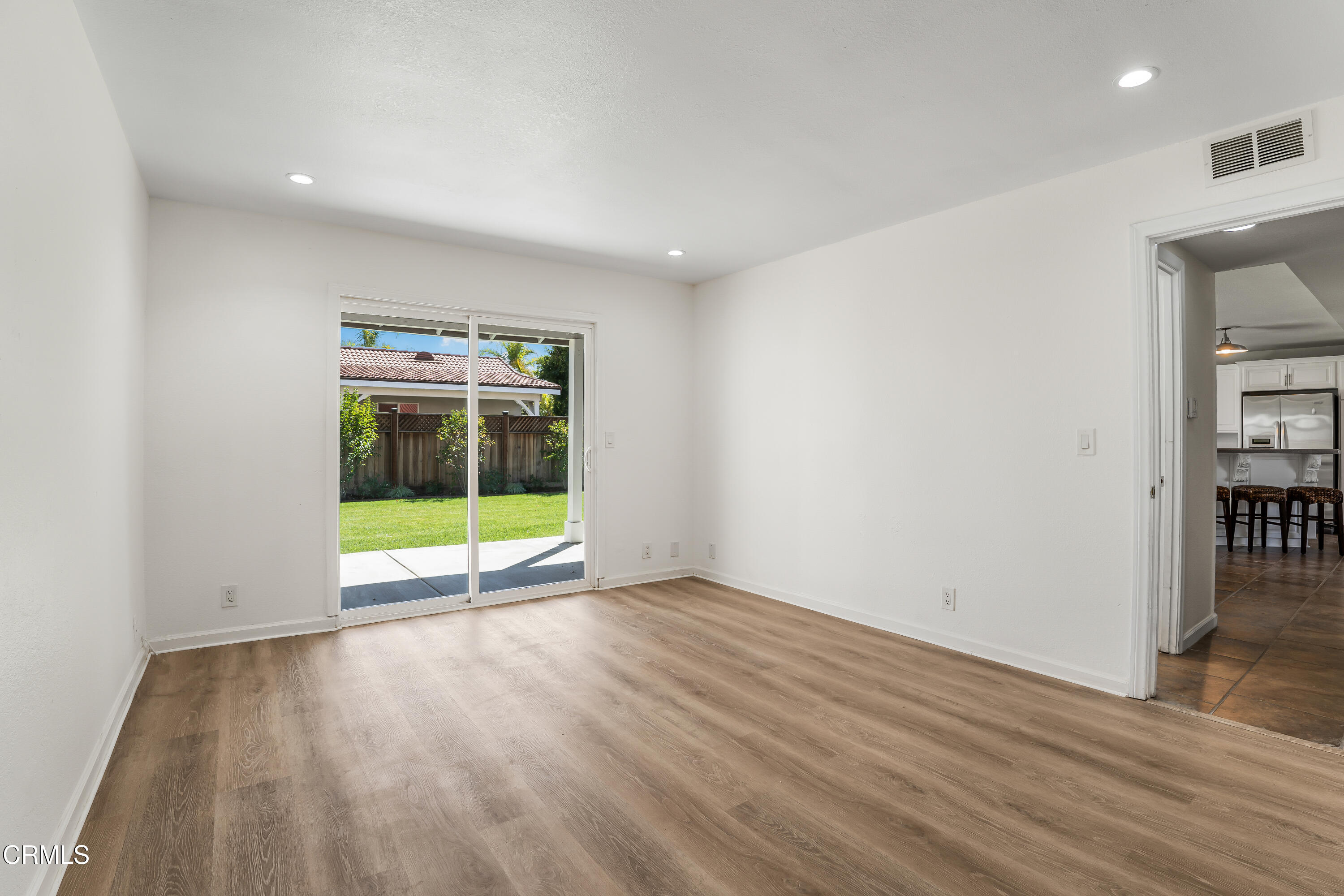 734 Balden Lane Fillmore, CA 93015 - Photo 22 of 46 a view of an empty room with wooden floor