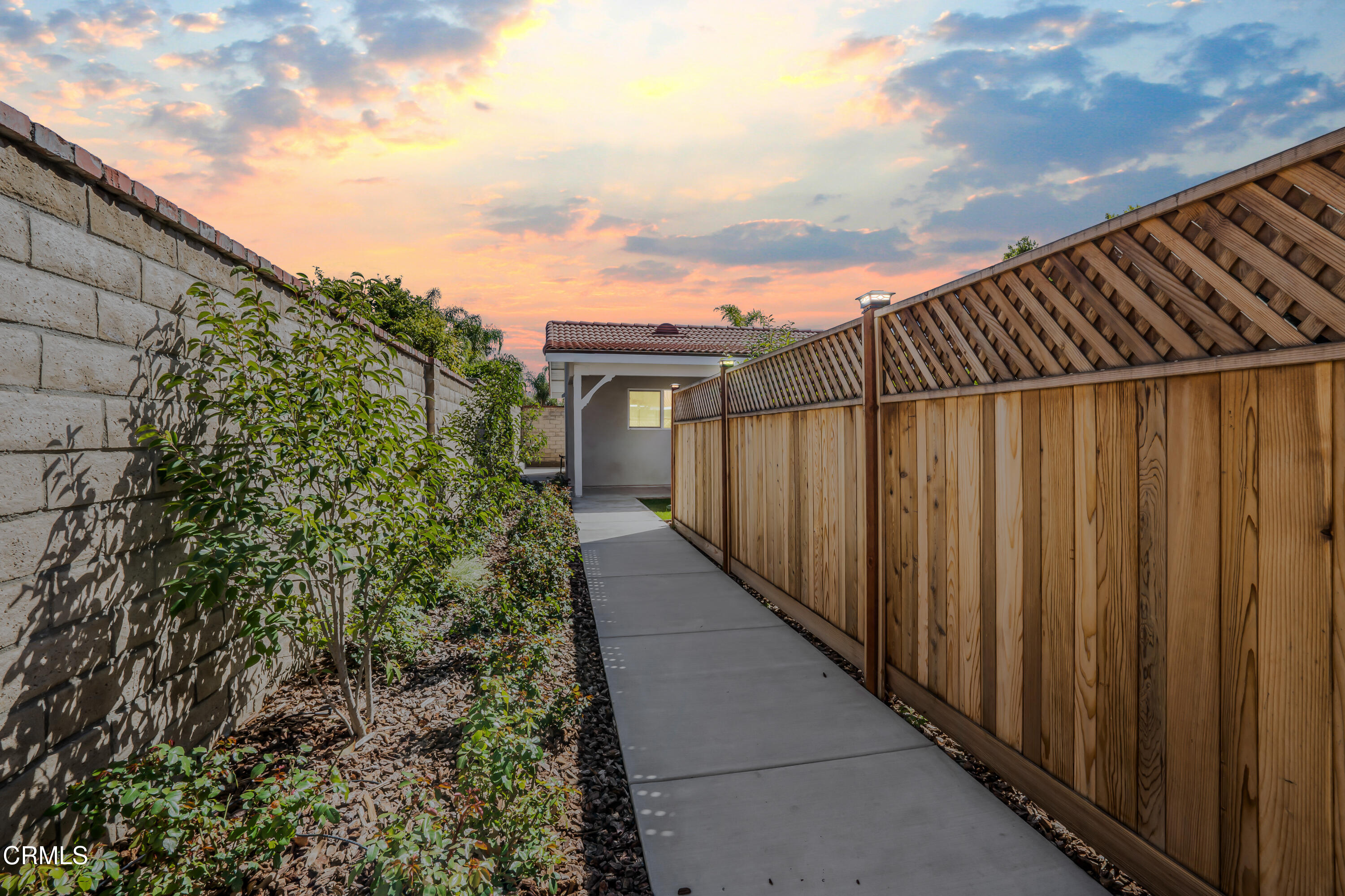 734 Balden Lane Fillmore, CA 93015 - Photo 27 of 46 a view of a pathway of a building with wooden fence