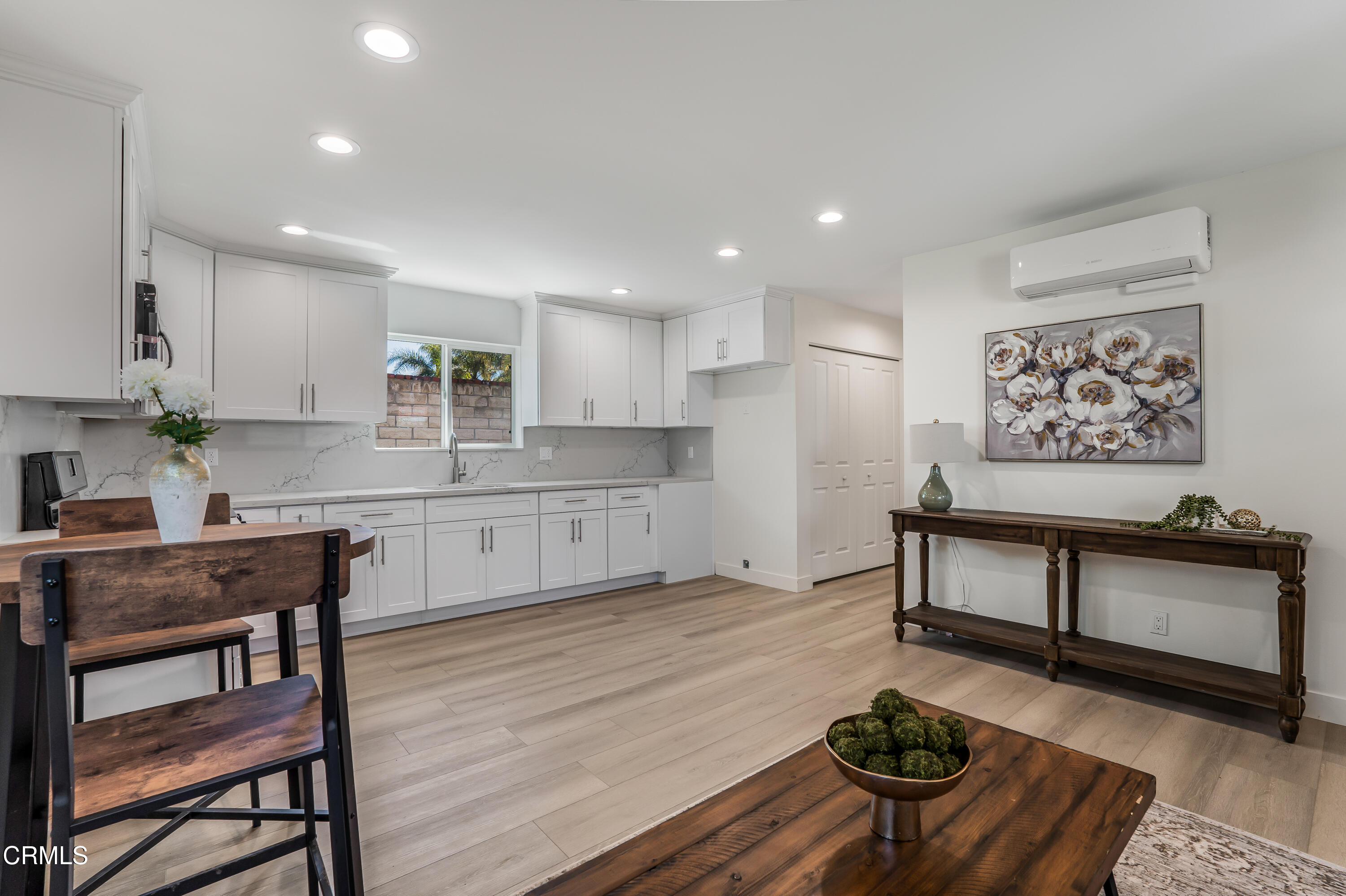 734 Balden Lane Fillmore, CA 93015 - Photo 30 of 46 a kitchen with stainless steel appliances granite countertop a stove and white cabinets