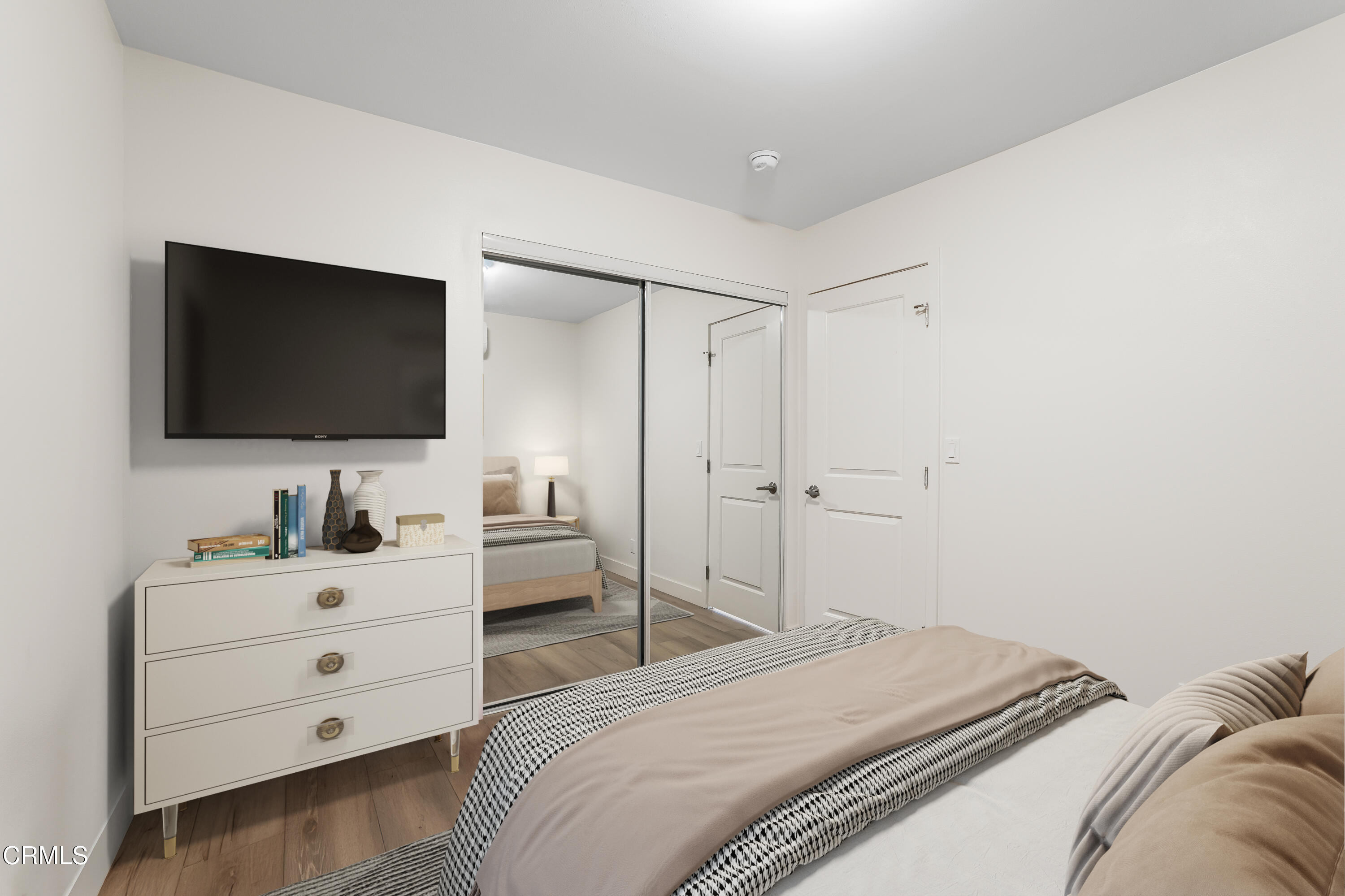 734 Balden Lane Fillmore, CA 93015 - Photo 35 of 46 a bedroom with a bed and a flat screen tv