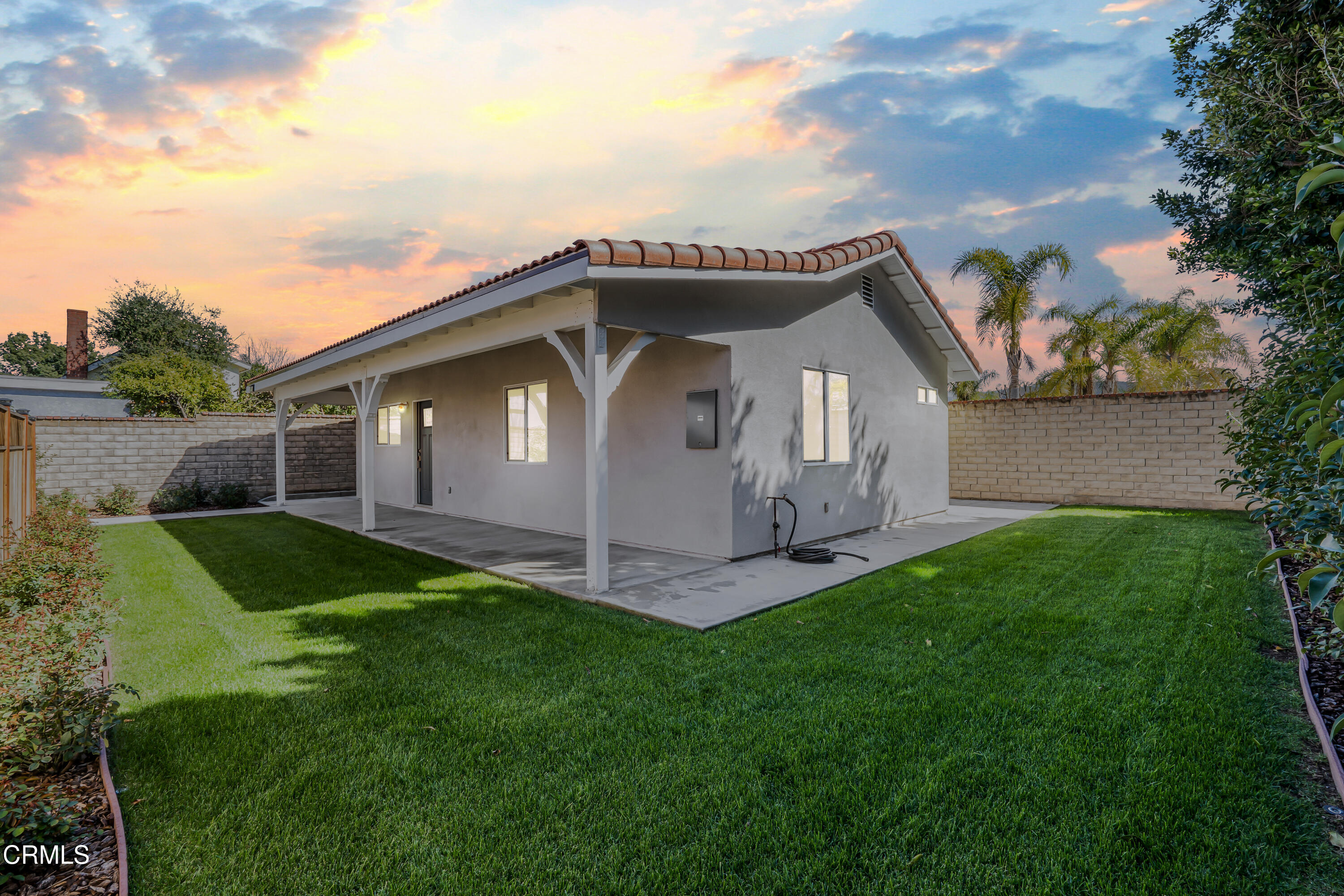 734 Balden Lane Fillmore, CA 93015 - Photo 38 of 46 a front view of a house with a garden and plants