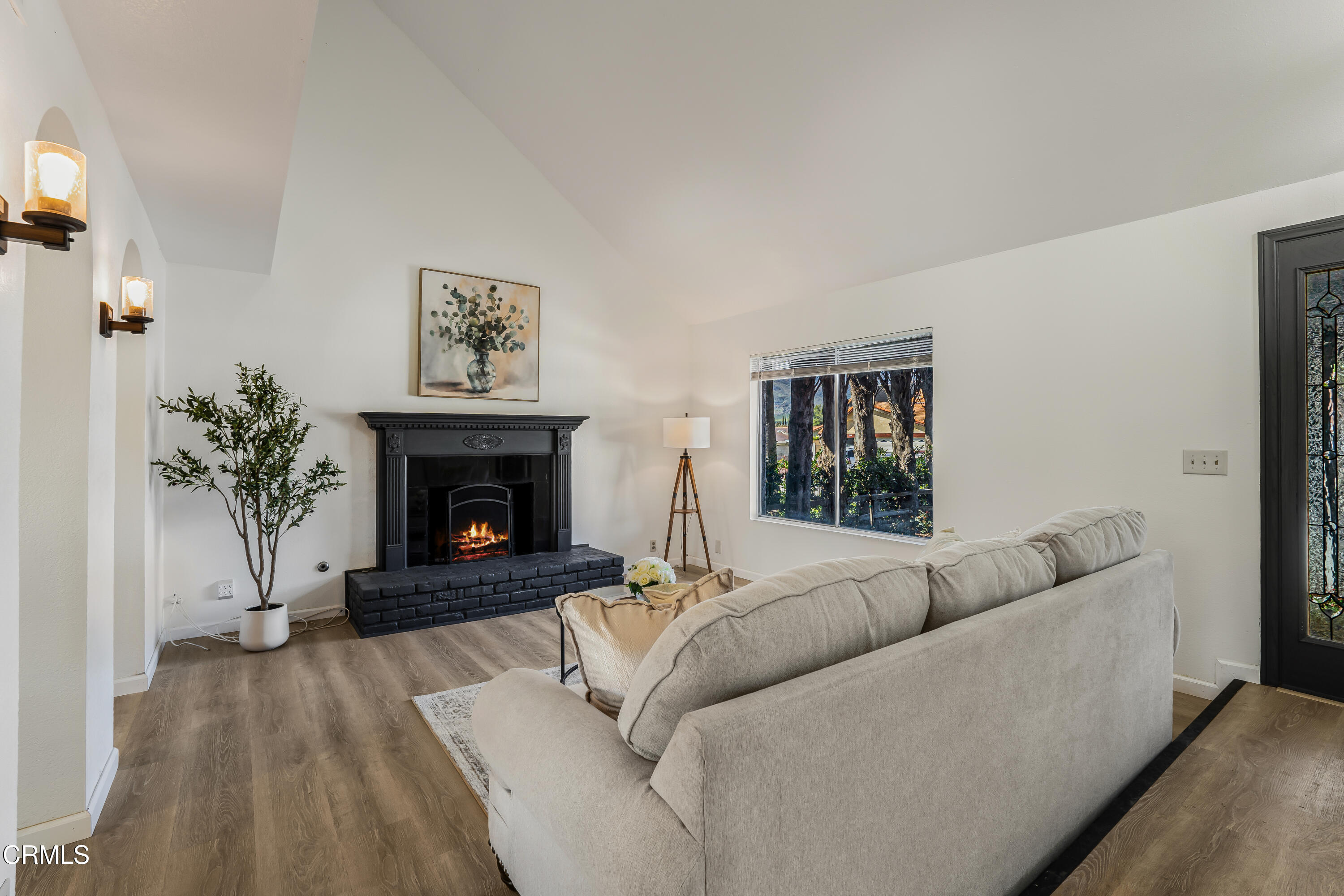 734 Balden Lane Fillmore, CA 93015 - Photo 5 of 46 a living room with furniture and a fireplace