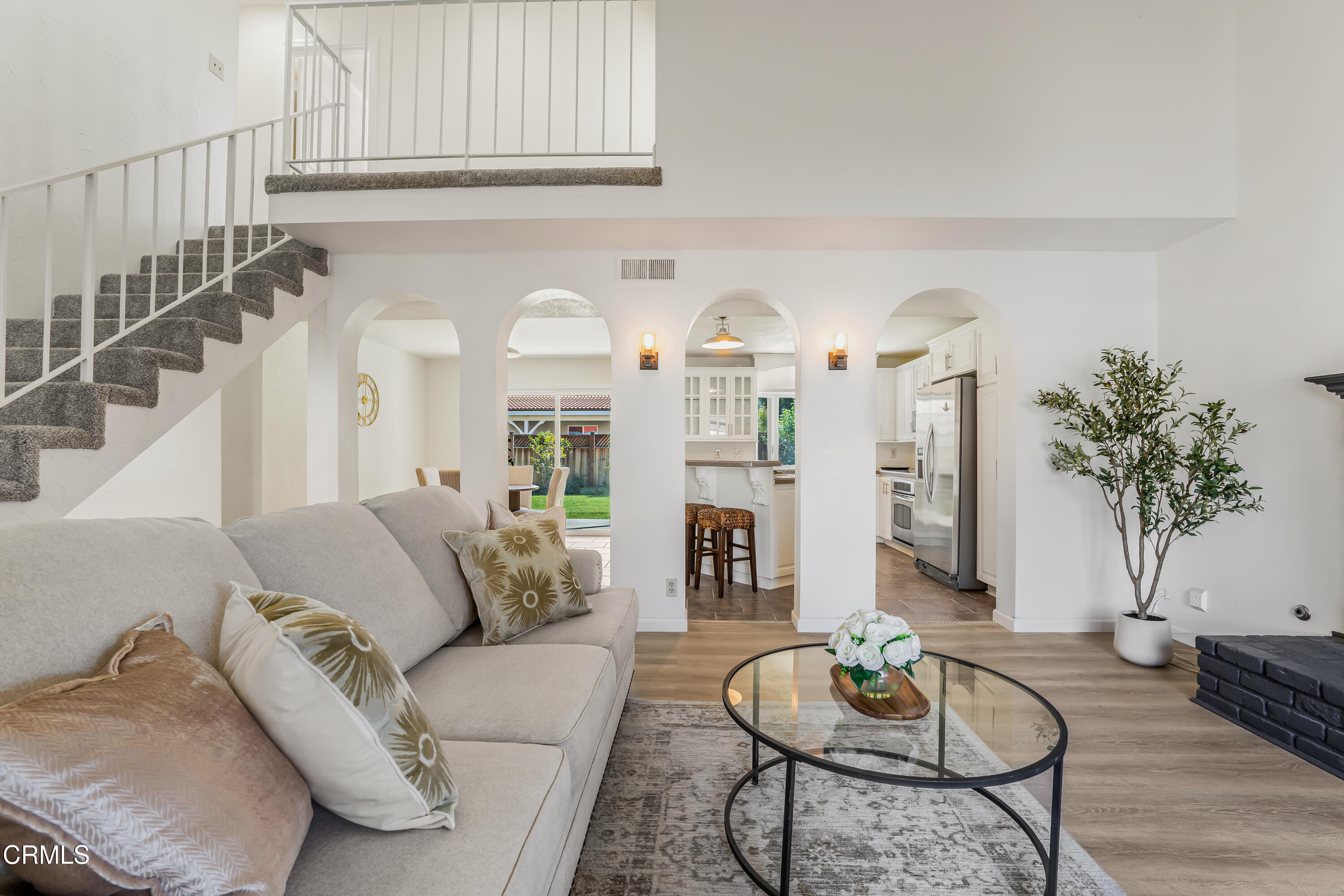 734 Balden Lane Fillmore, CA 93015 - Photo 6 of 46 a living room with furniture kitchen view and a potted plant