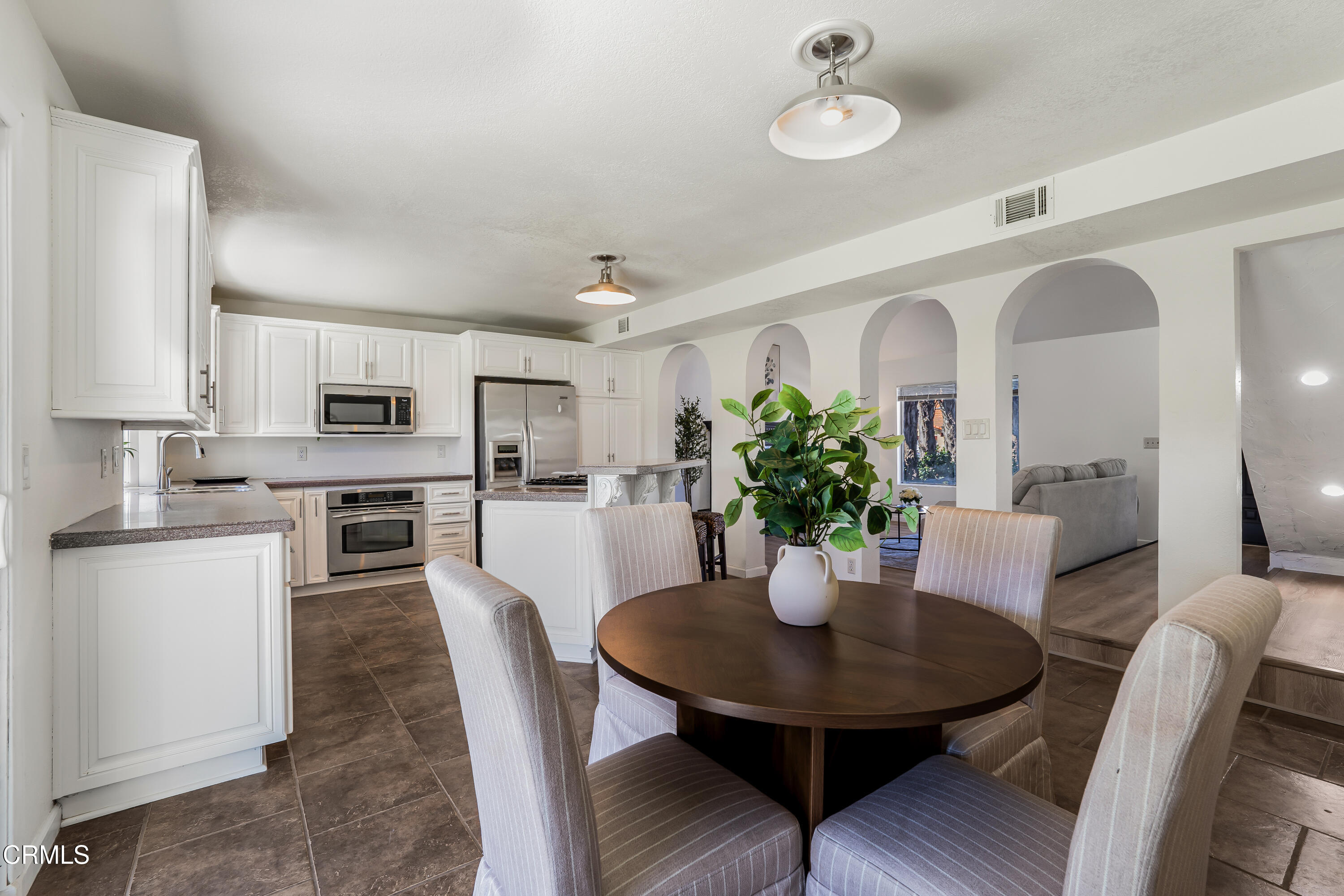 734 Balden Lane Fillmore, CA 93015 - Photo 10 of 46 a view of a dining room with furniture and wooden floor