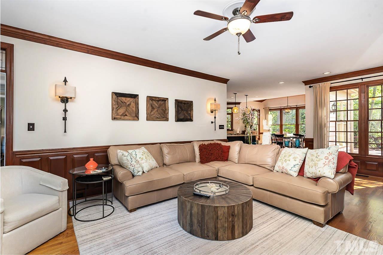 7512 Rainwater Road Raleigh, NC 27615 - Photo 18 of 45 a living room with furniture ceiling fan and a window