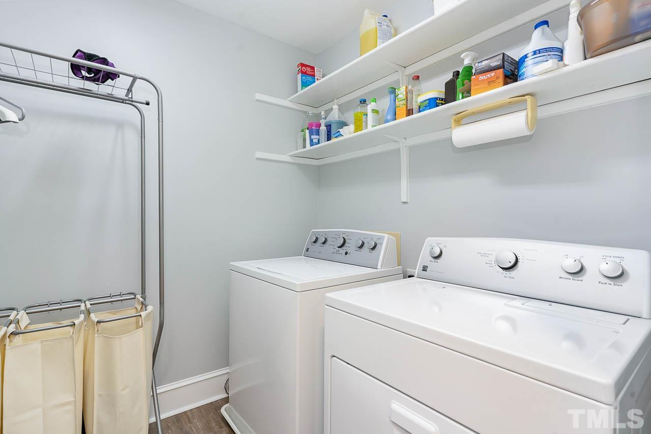 7512 Rainwater Road Raleigh, NC 27615 - Photo 40 of 45 a utility room with dryer and washer