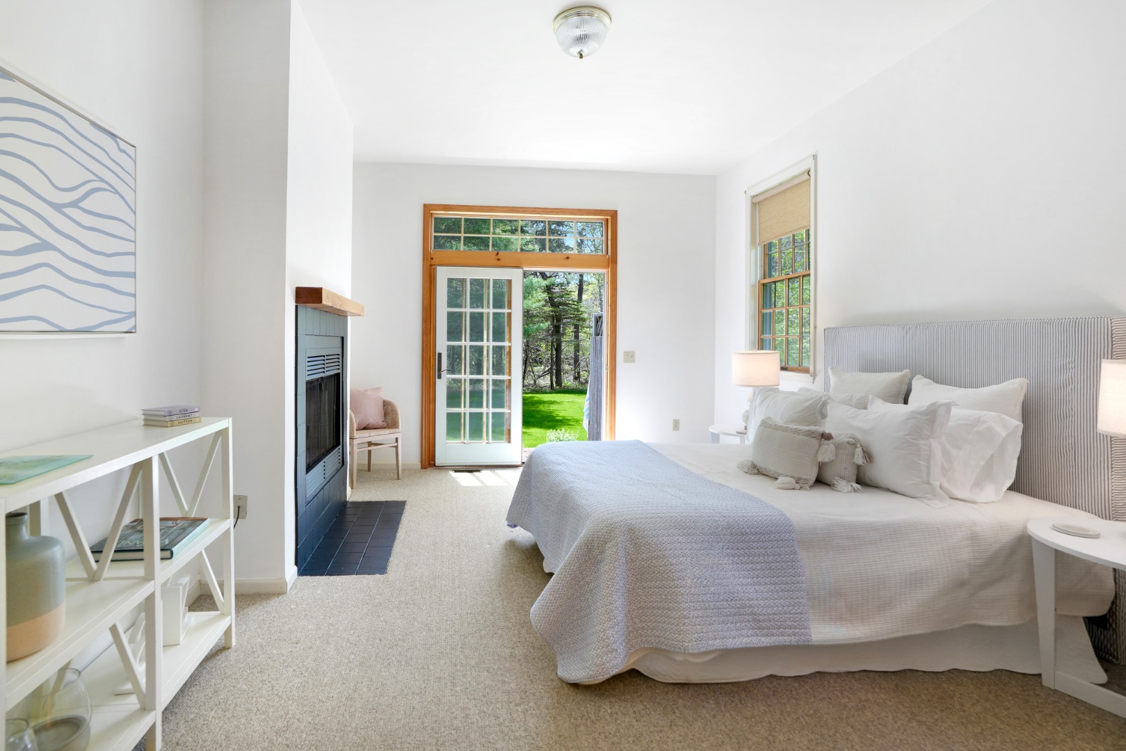 2 Cosmos Way Edgartown, MA 02539 - Photo 16 of 29 a bedroom with a bed and a large window