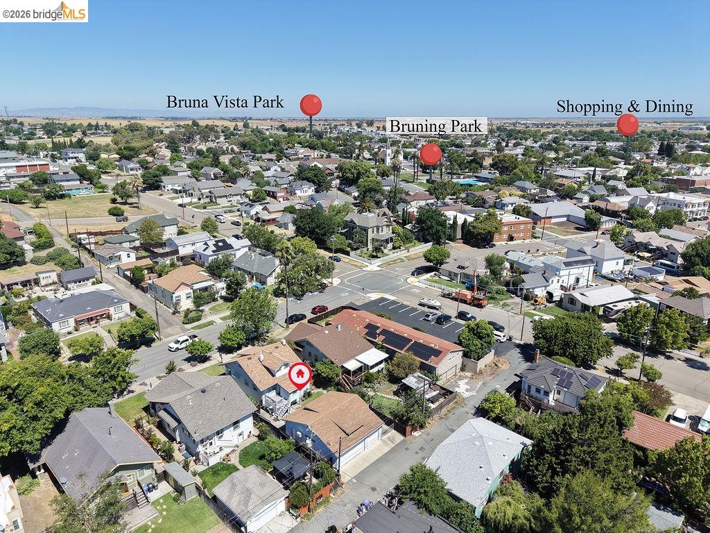 325 South 2nd Street Rio Vista, CA 94571 - Photo 2 of 33 Aerial perspective showcasing a residential neighborhood with a variety of single-family homes and mature trees