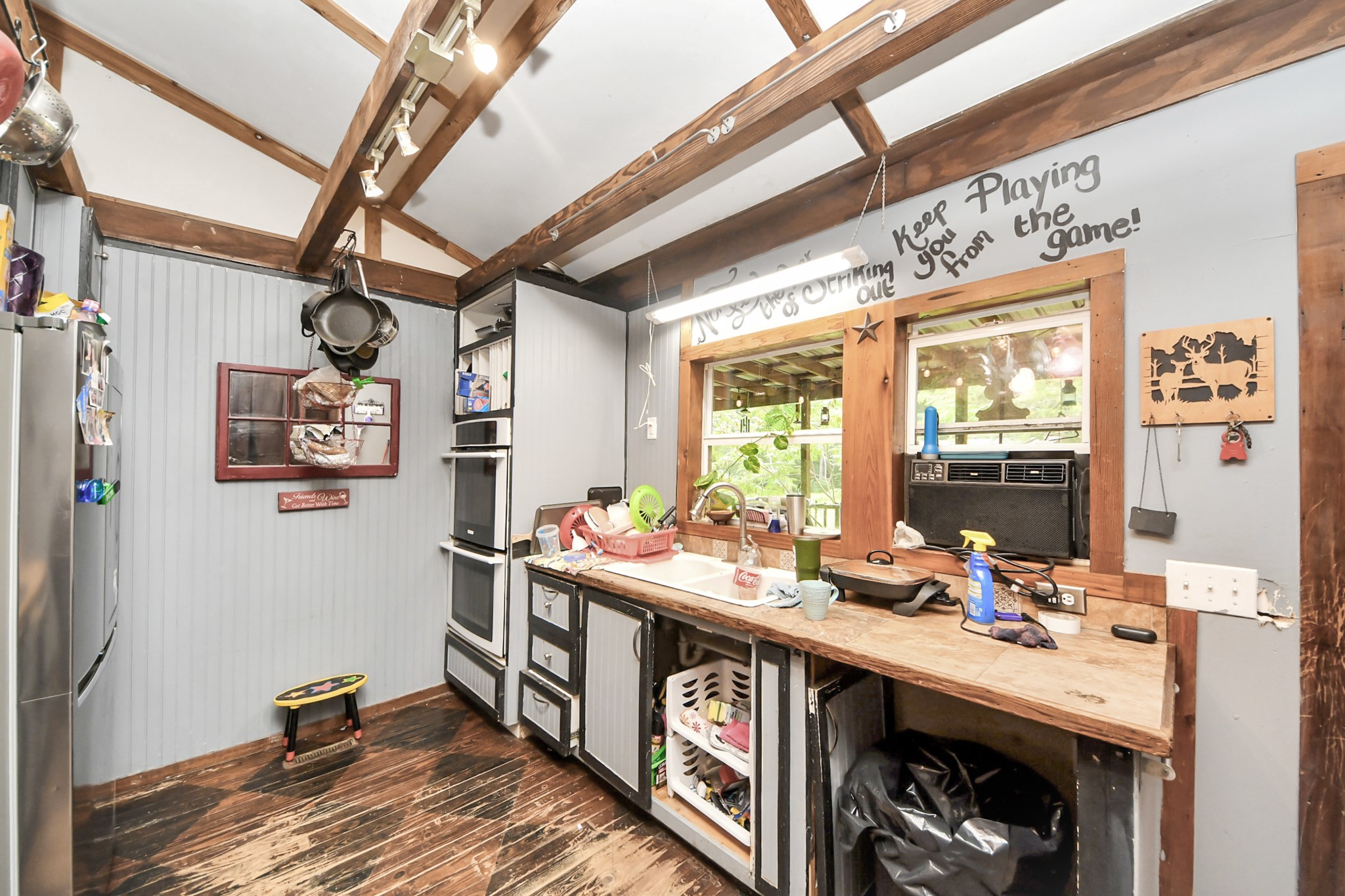 101 Rocky Road Livingston, TX 77351 - Photo 16 of 42 a room with stainless steel appliances a stove and a window