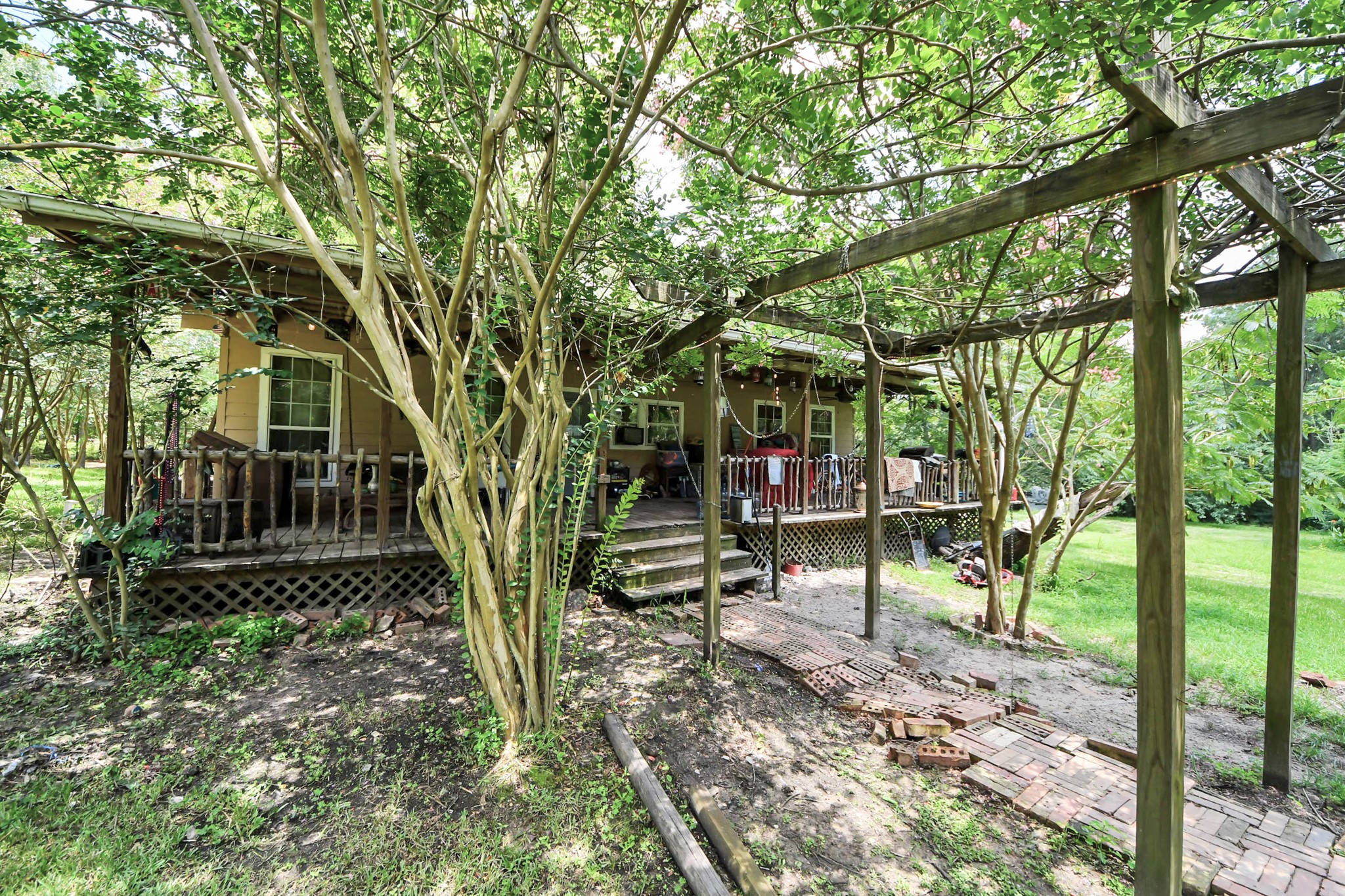 101 Rocky Road Livingston, TX 77351 - Photo 34 of 42 a view of outdoor space and deck