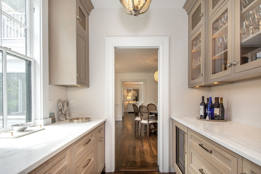 41 Brigantine Circle Norwell, MA 02061 - Photo 14 of 37 a kitchen with a sink cabinets and a wooden floor