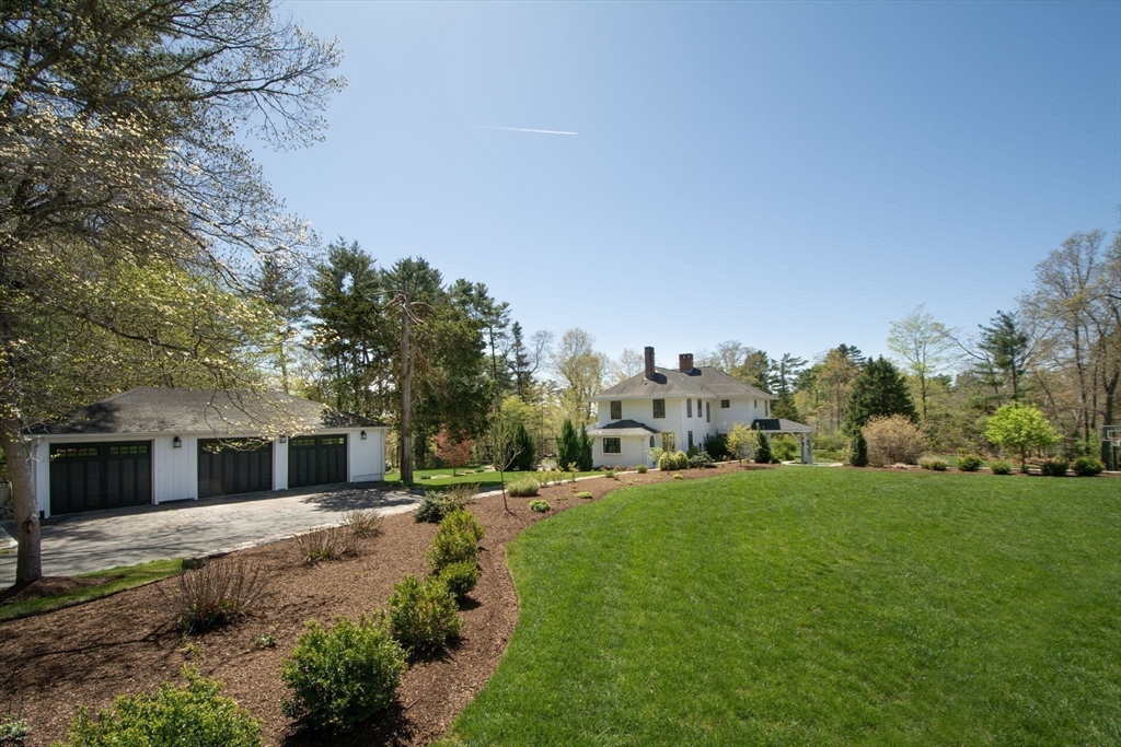 41 Brigantine Circle Norwell, MA 02061 - Photo 2 of 37 a front view of a house with a yard and tree s