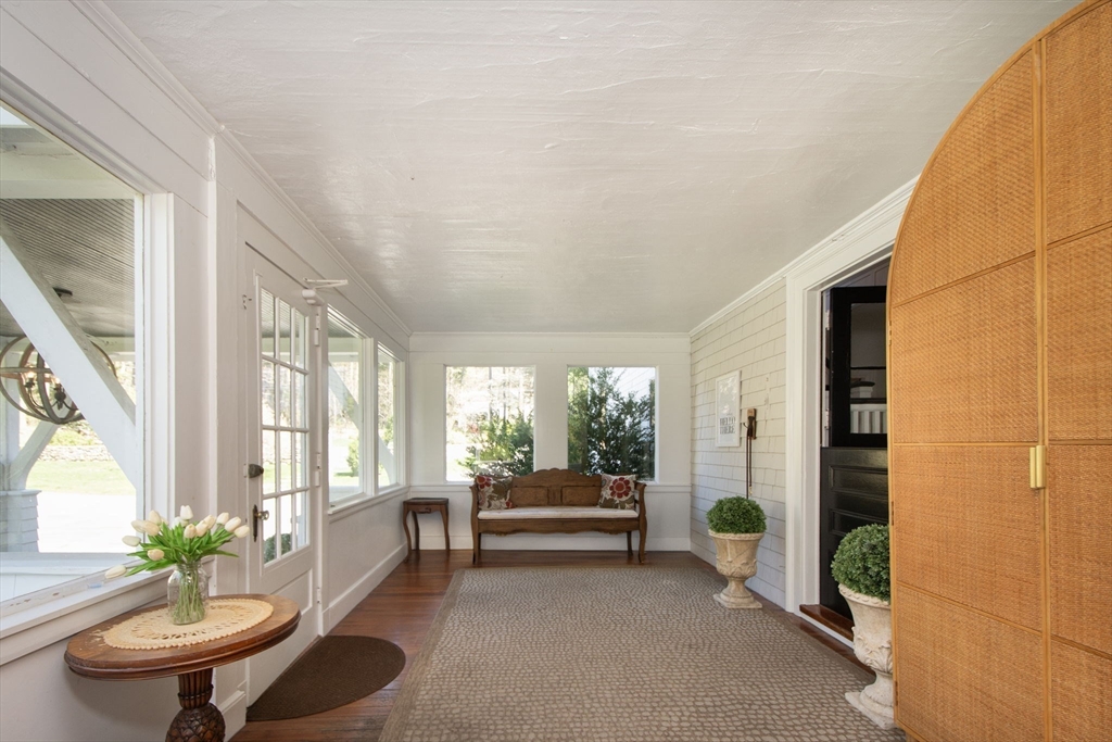 41 Brigantine Circle Norwell, MA 02061 - Photo 22 of 37 a living room with furniture and a large window