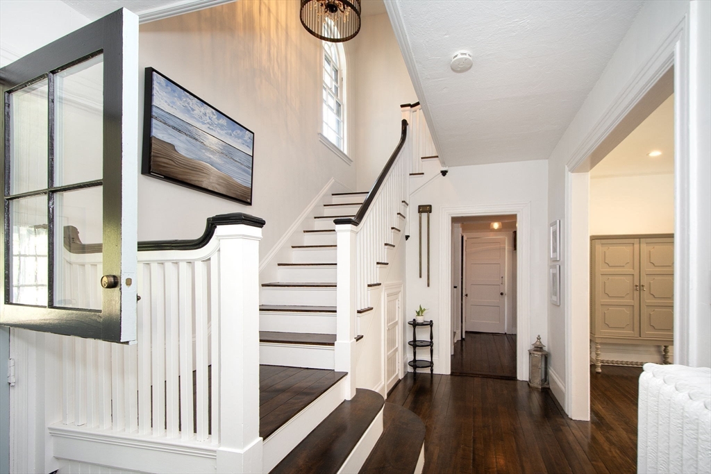 41 Brigantine Circle Norwell, MA 02061 - Photo 23 of 37 a view of entryway with wooden floor and stairs