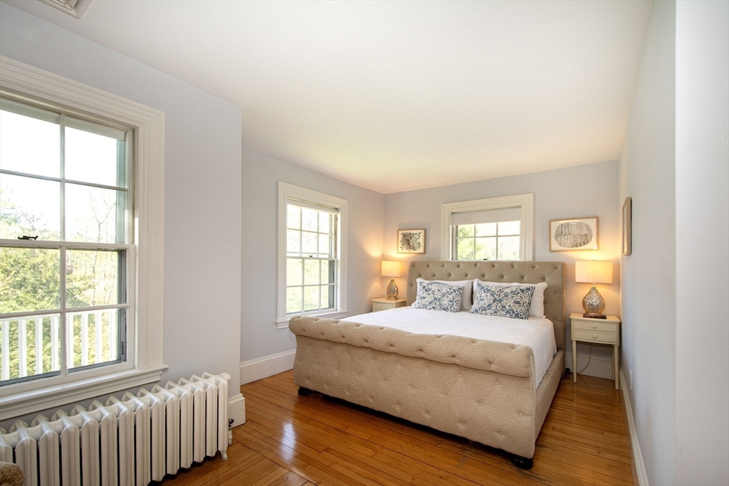 41 Brigantine Circle Norwell, MA 02061 - Photo 27 of 37 a bedroom with a bed and window