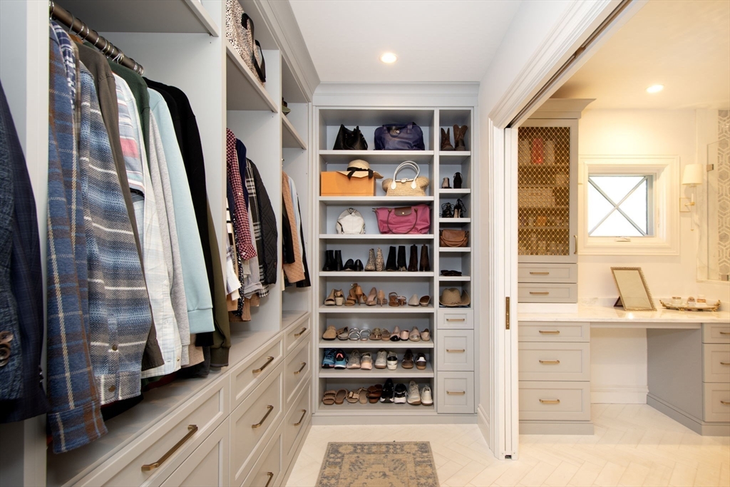 41 Brigantine Circle Norwell, MA 02061 - Photo 28 of 37 a view of walk in closet with clothes and shoes