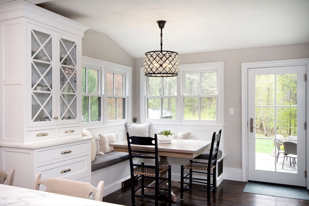 41 Brigantine Circle Norwell, MA 02061 - Photo 9 of 37 a view of a dining room with furniture and windows