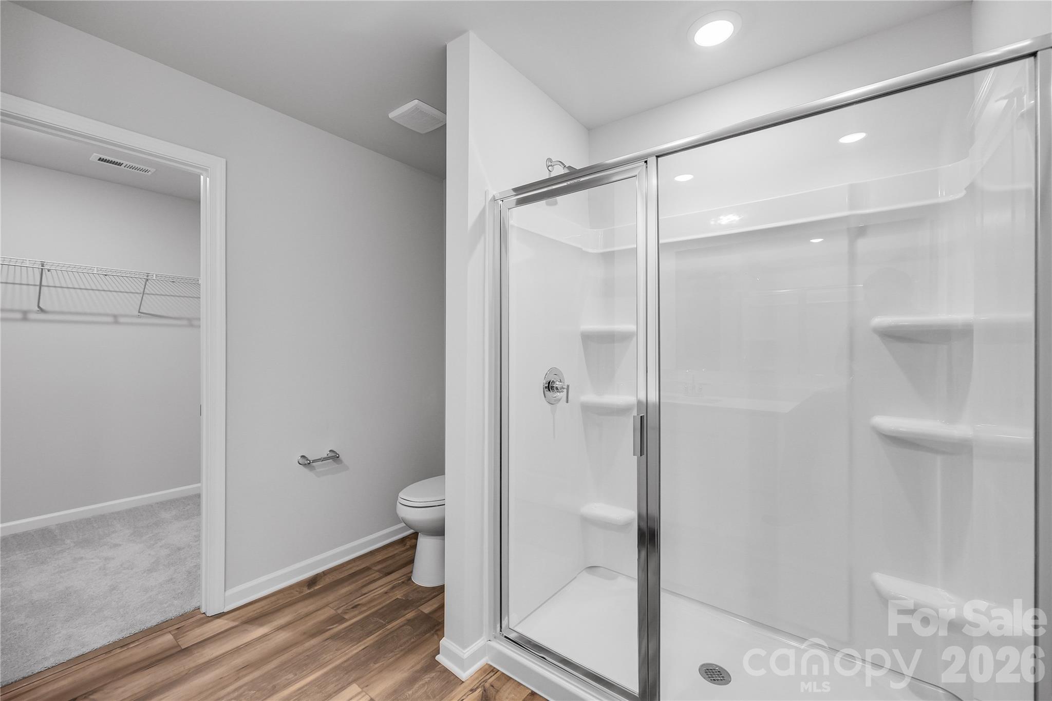 233 West 18th Street Kannapolis, NC 28081 - Photo 22 of 27 a bathroom with a glass shower door