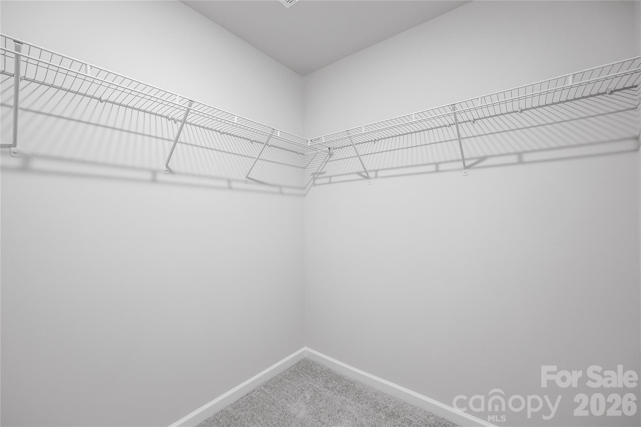 233 West 18th Street Kannapolis, NC 28081 - Photo 25 of 27 a view of a room with racks on the wall