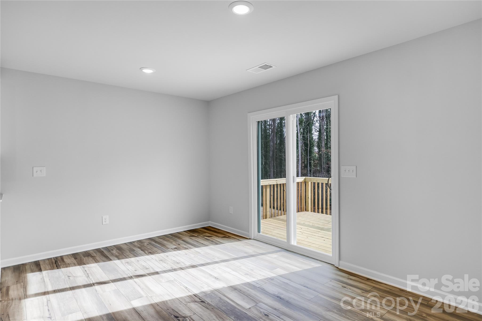 233 West 18th Street Kannapolis, NC 28081 - Photo 5 of 27 a view of an empty room