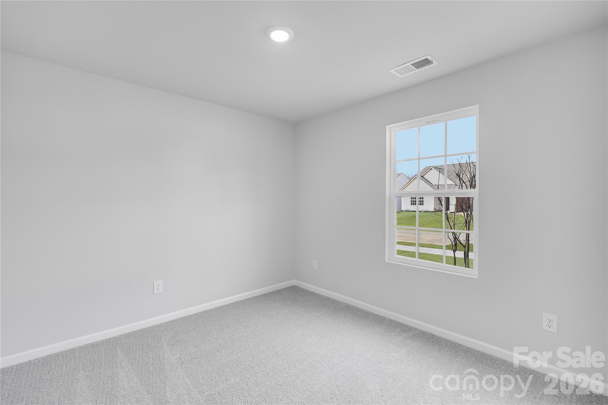 233 West 18th Street Kannapolis, NC 28081 - Photo 7 of 27 an empty room with windows