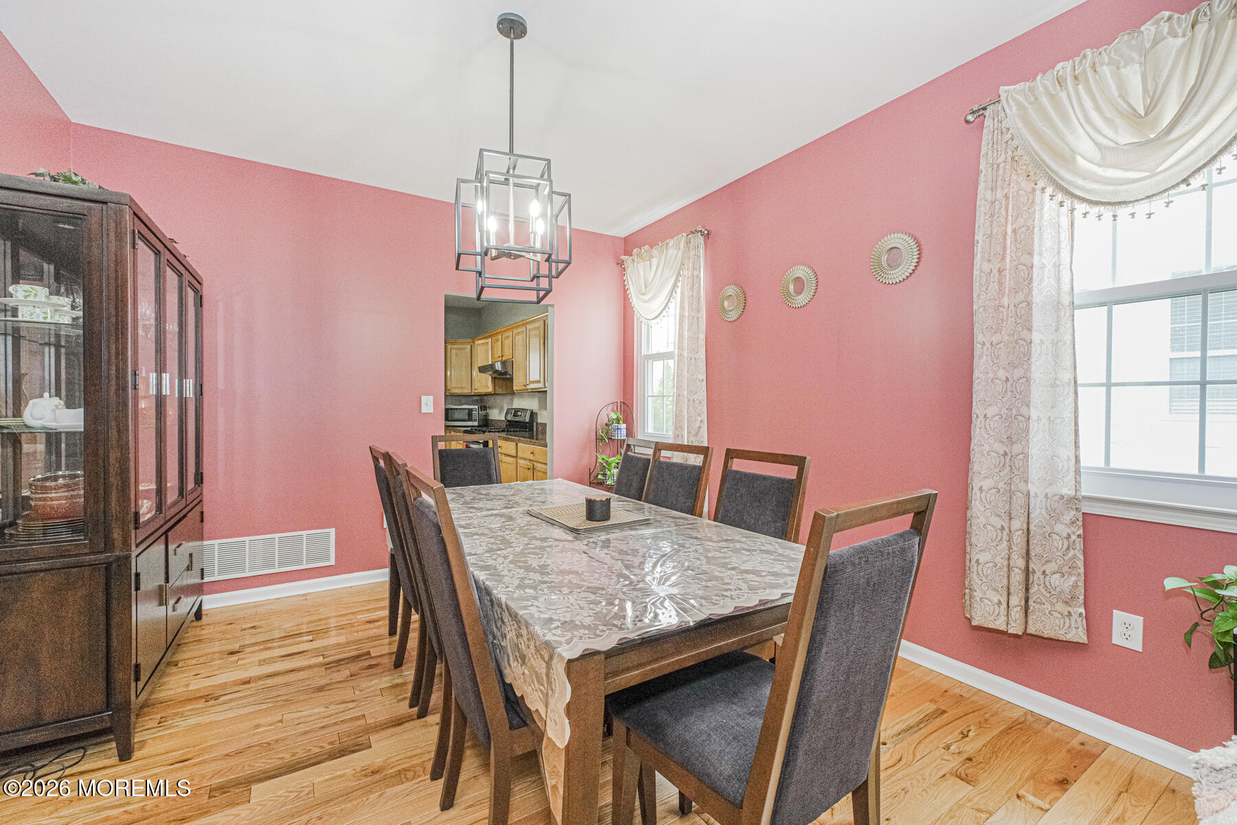 315 Wedgewood Road Morganville, NJ 07751 - Photo 9 of 37 a view of a dining room with furniture window and wooden floor