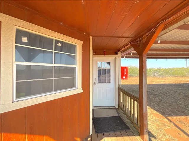 a view of a balcony with an outdoor space