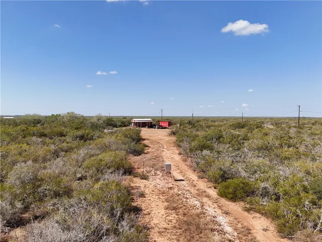 a view of beach and mountain