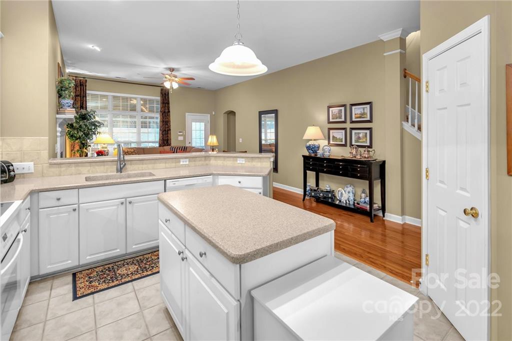 17018 Carlton Way Road Huntersville, NC 28078 - Photo 17 of 42 a kitchen with stainless steel appliances granite countertop a refrigerator and a stove top oven