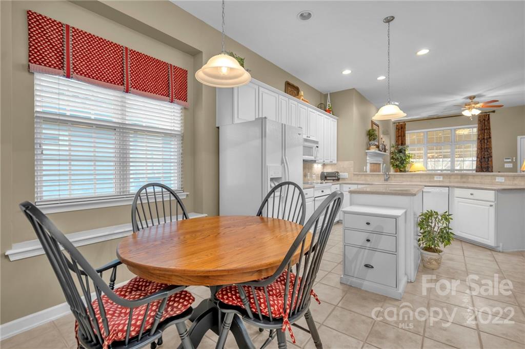 17018 Carlton Way Road Huntersville, NC 28078 - Photo 23 of 42 a view of a dining room and livingroom with furniture