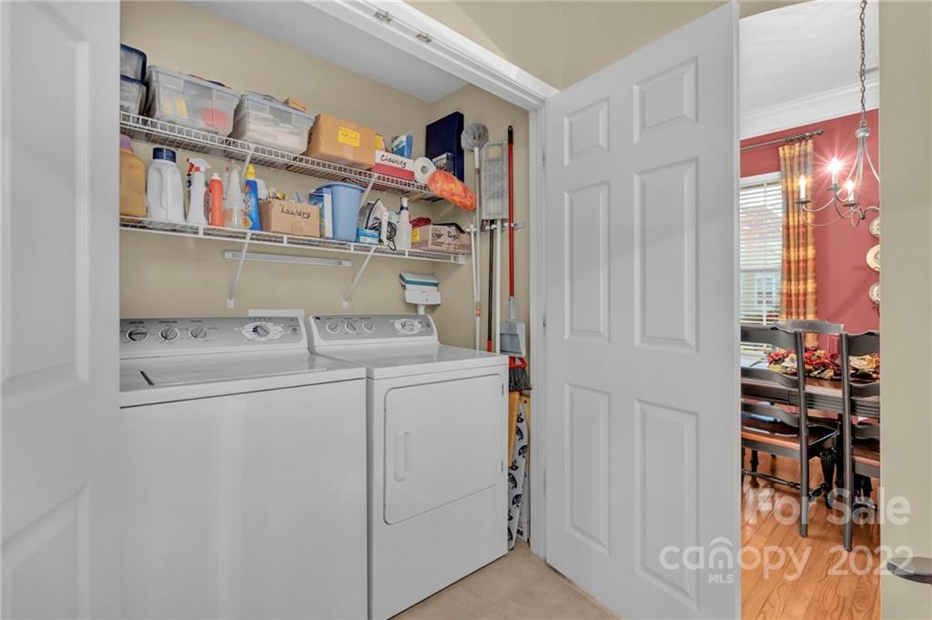 17018 Carlton Way Road Huntersville, NC 28078 - Photo 24 of 42 a view of storage and utility room with washer and dryer