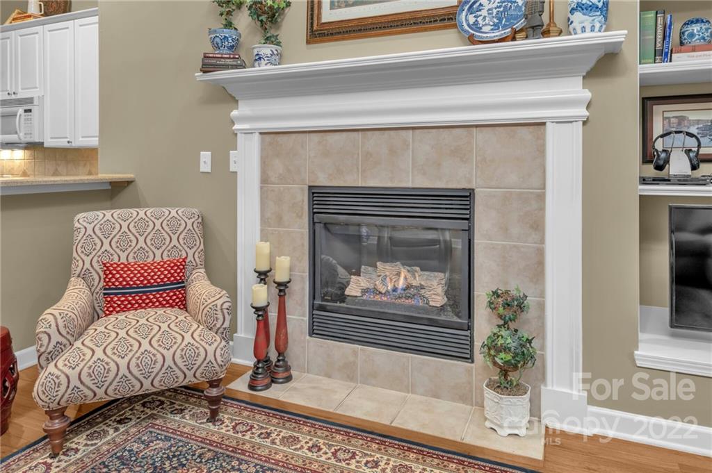 17018 Carlton Way Road Huntersville, NC 28078 - Photo 29 of 42 a living room with furniture and a fireplace