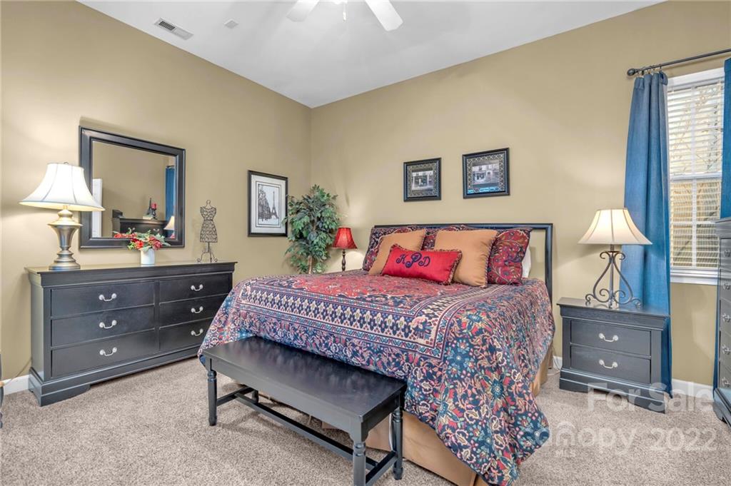 17018 Carlton Way Road Huntersville, NC 28078 - Photo 30 of 42 a bedroom with a bed and a dresser