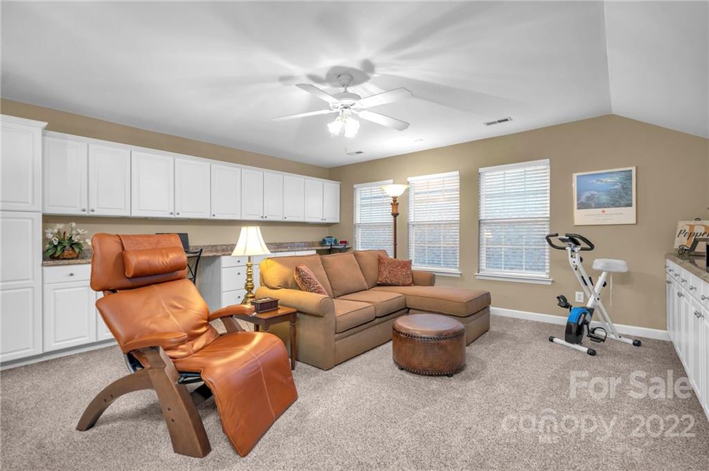 17018 Carlton Way Road Huntersville, NC 28078 - Photo 40 of 42 a living room with furniture and a large window