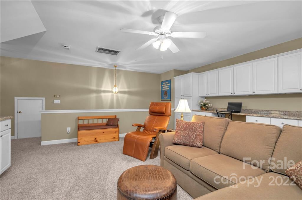 17018 Carlton Way Road Huntersville, NC 28078 - Photo 41 of 42 a living room with furniture a air conditioner and a window