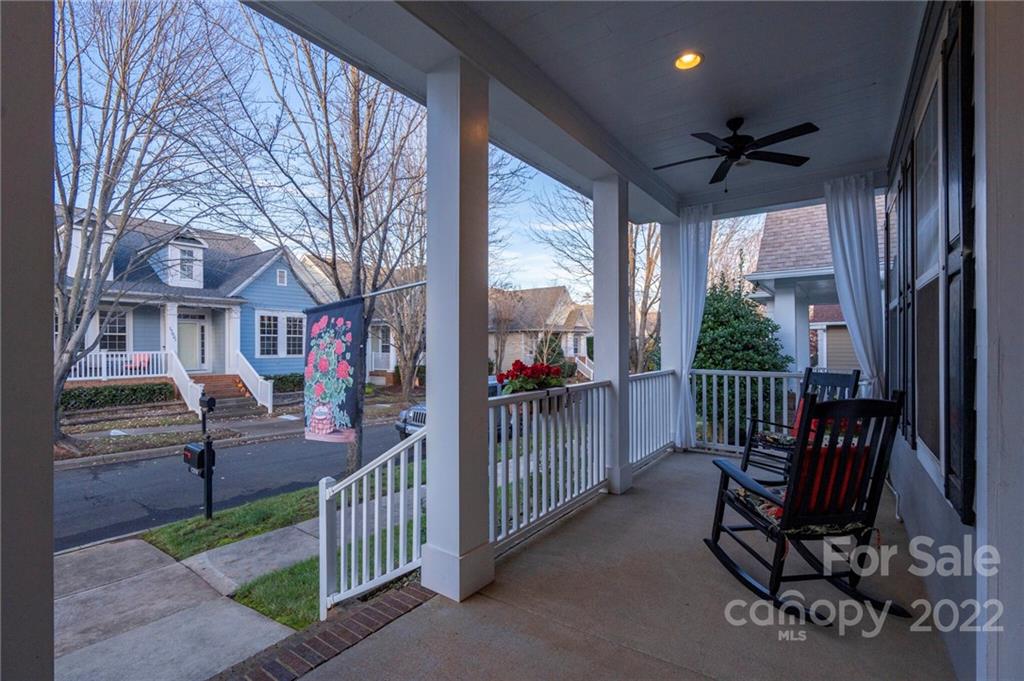 17018 Carlton Way Road Huntersville, NC 28078 - Photo 5 of 42 a view of a porch with wooden floor and iron fence