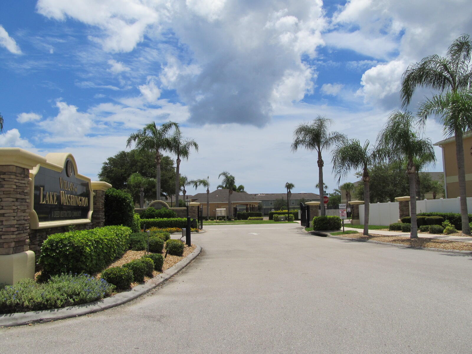 2795 Reston Street, Unit 104 Melbourne, FL 32935 - Photo 32 of 36 a view of a park with swings and slides