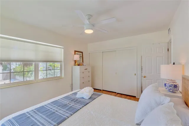 a view of a swimming pool with a yard