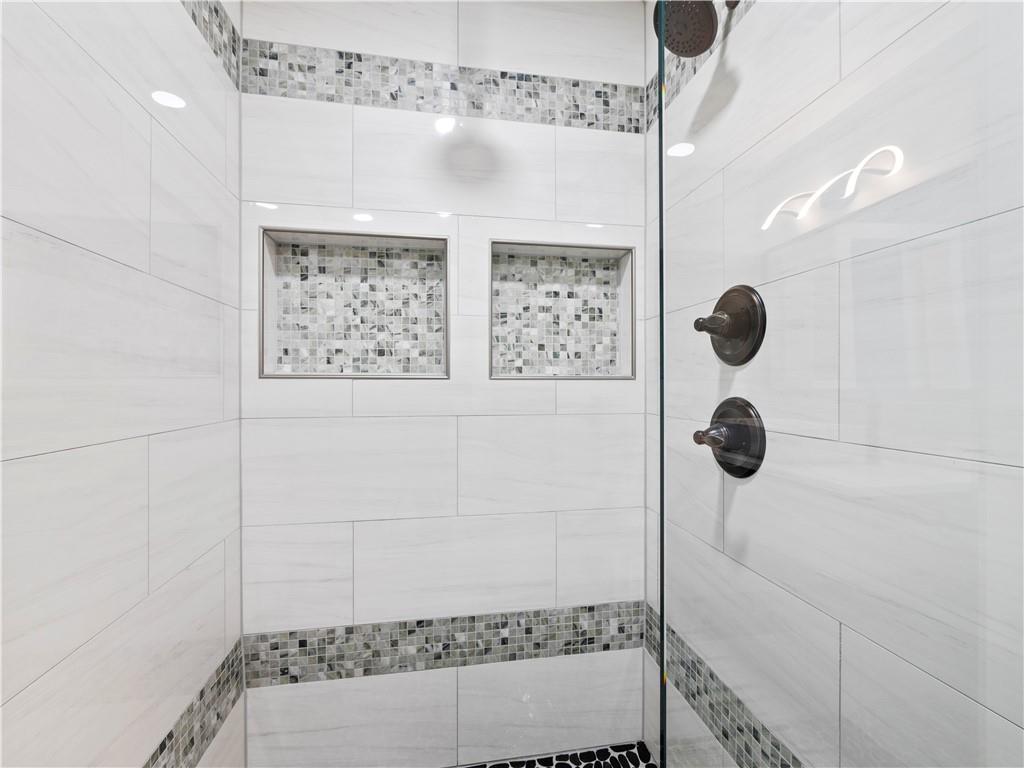 5209 Byers Road Gainesville, GA 30504 - Photo 19 of 34 a bathroom with a shower