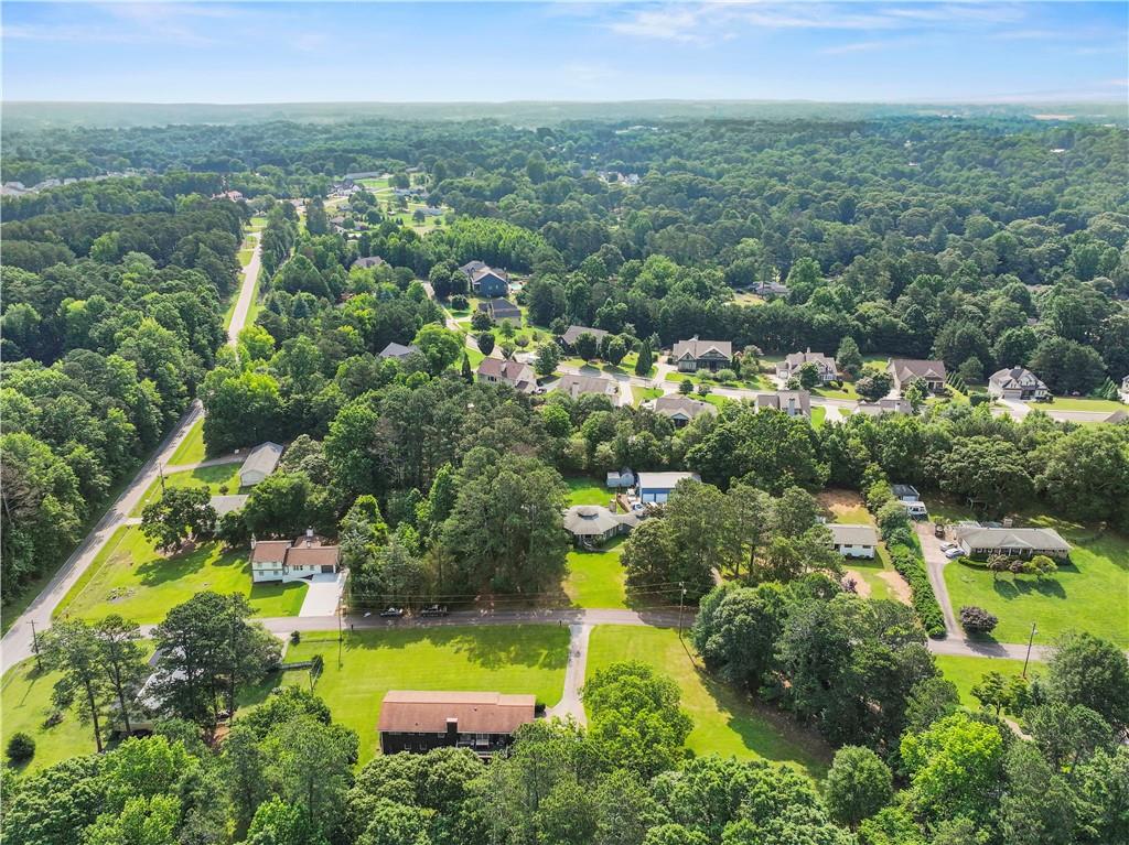 5209 Byers Road Gainesville, GA 30504 - Photo 30 of 34 an aerial view of residential houses with outdoor space and trees