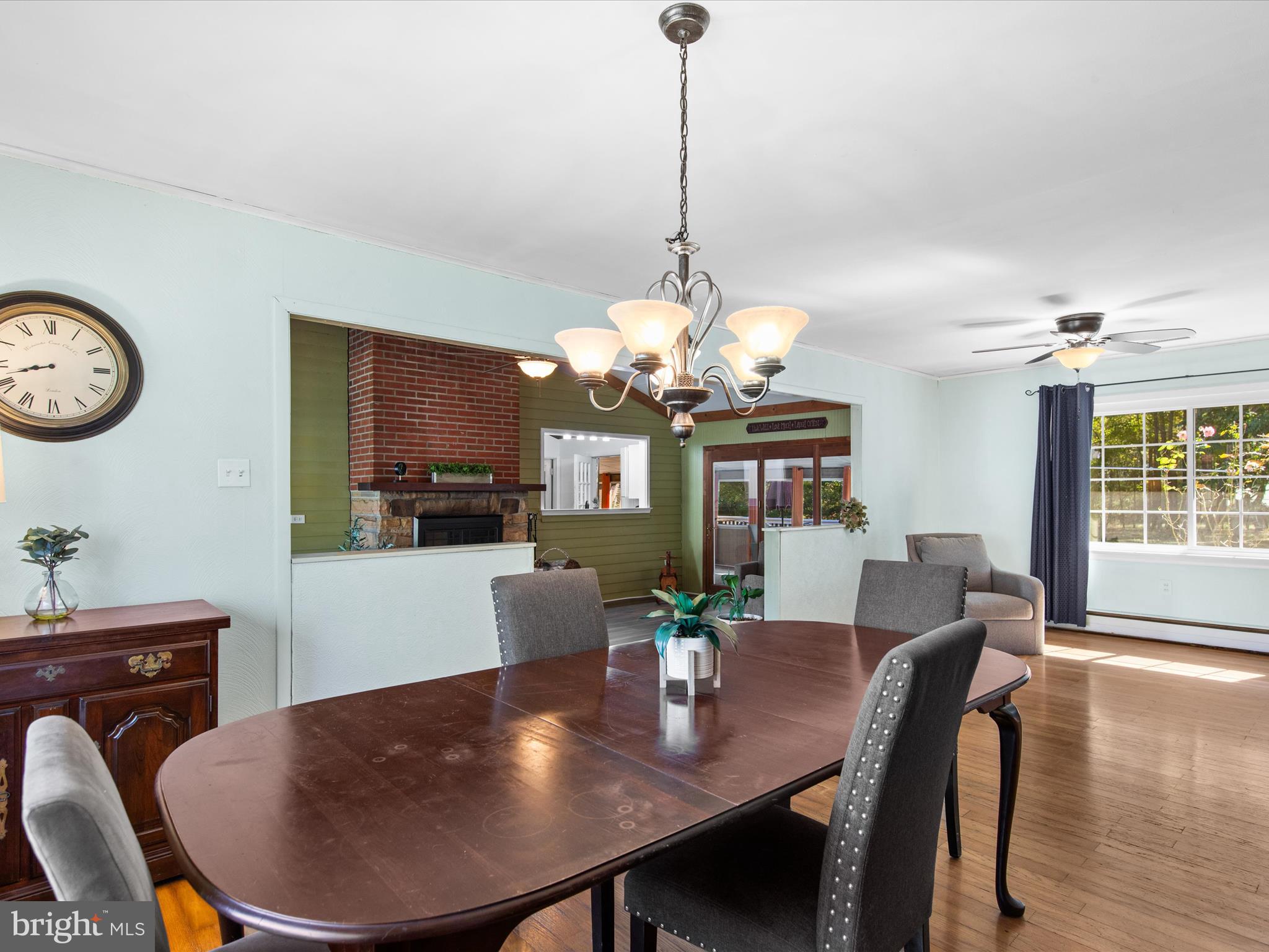 26905 Mt Vernon Road Princess Anne, MD 21853 - Photo 28 of 74 a view of a dining room with furniture window and wooden floor