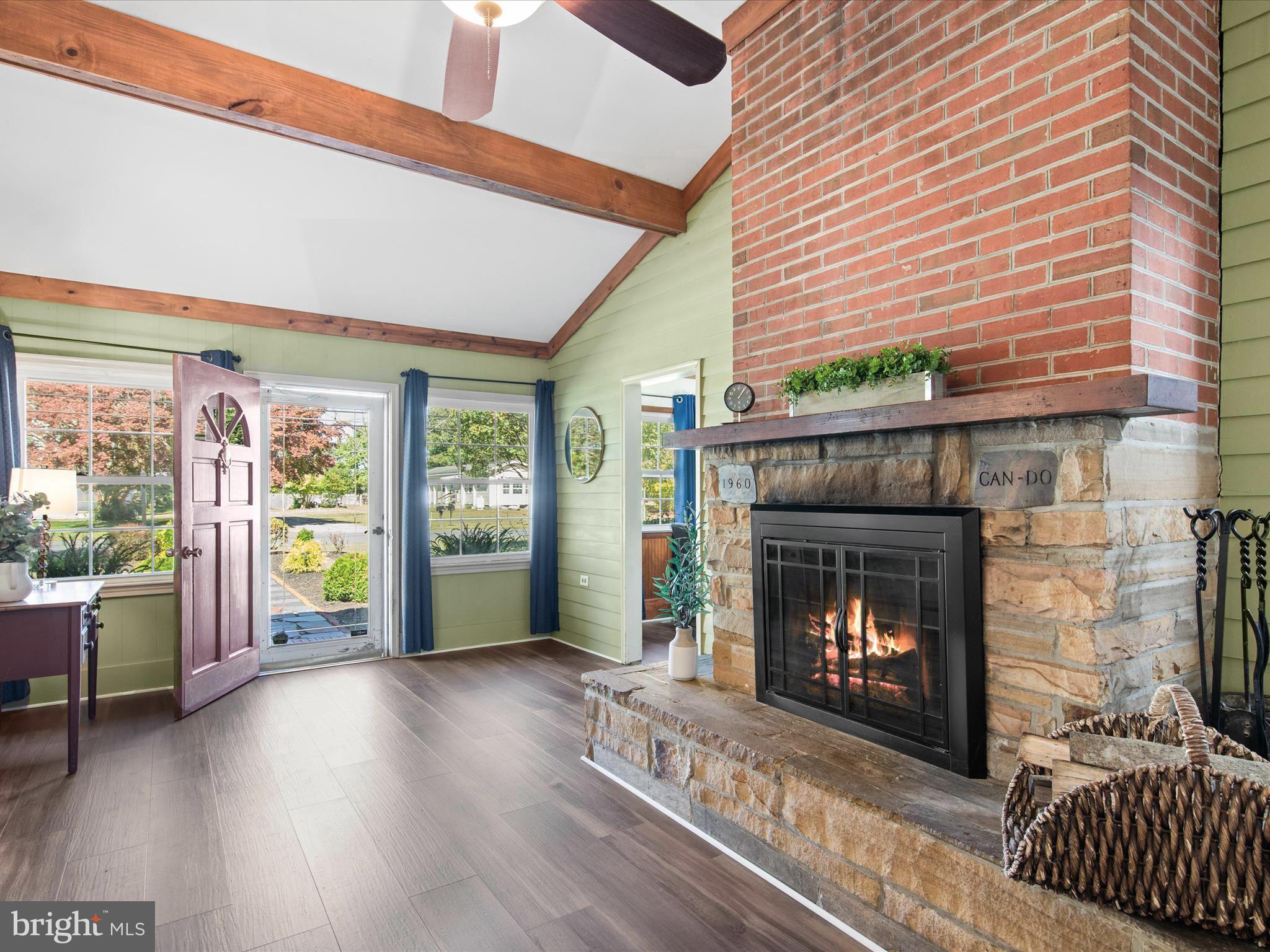 26905 Mt Vernon Road Princess Anne, MD 21853 - Photo 4 of 74 a living room with furniture and a fireplace