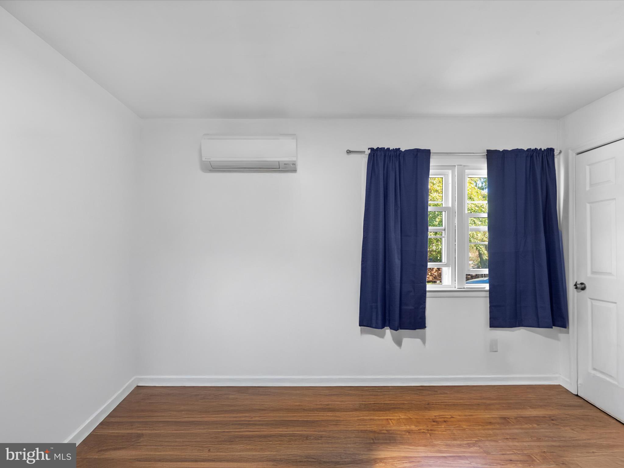 26905 Mt Vernon Road Princess Anne, MD 21853 - Photo 43 of 74 a view of room with window and hardwood floor