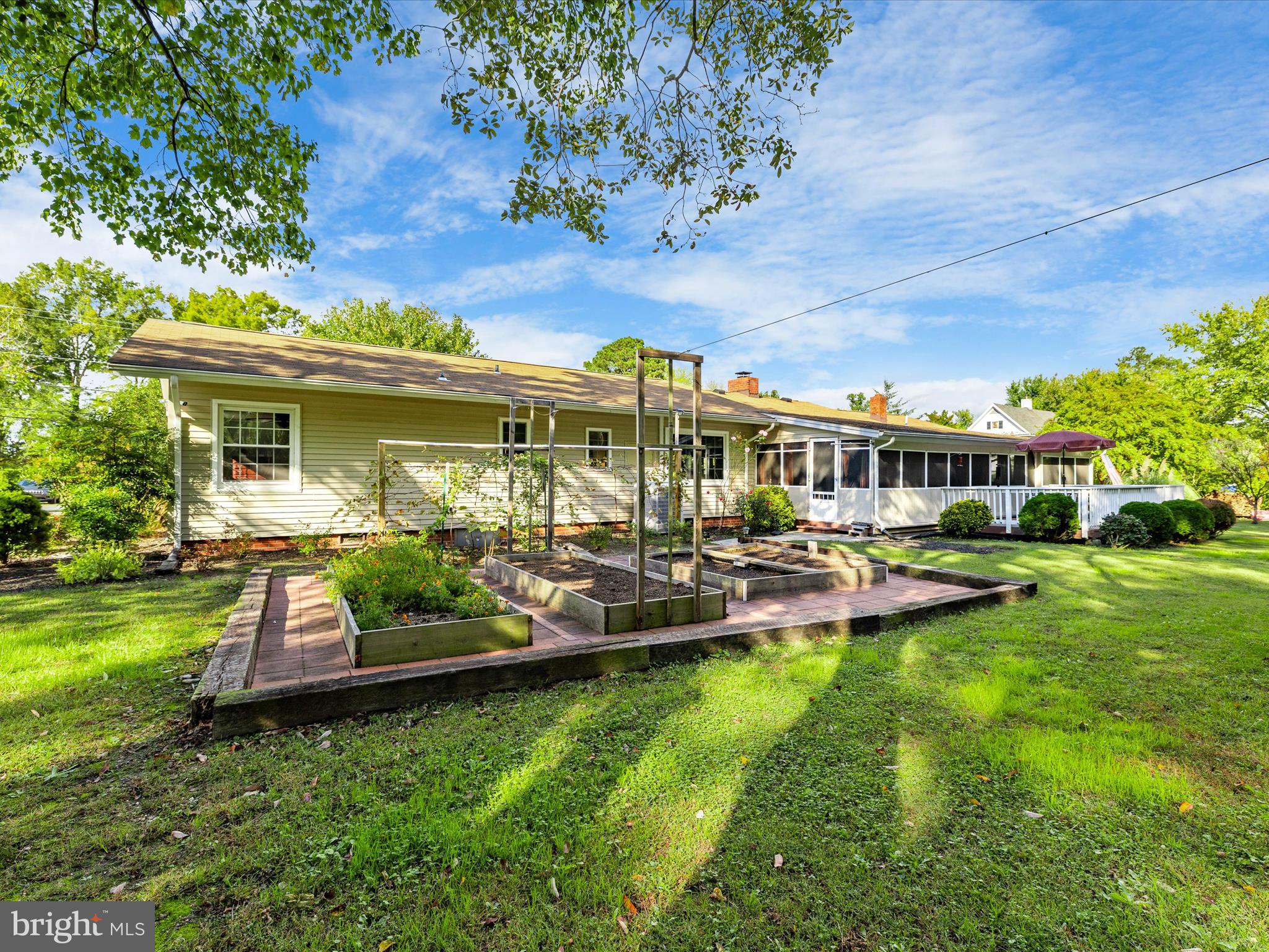 26905 Mt Vernon Road Princess Anne, MD 21853 - Photo 50 of 74 a view of a house with swimming pool garden and patio