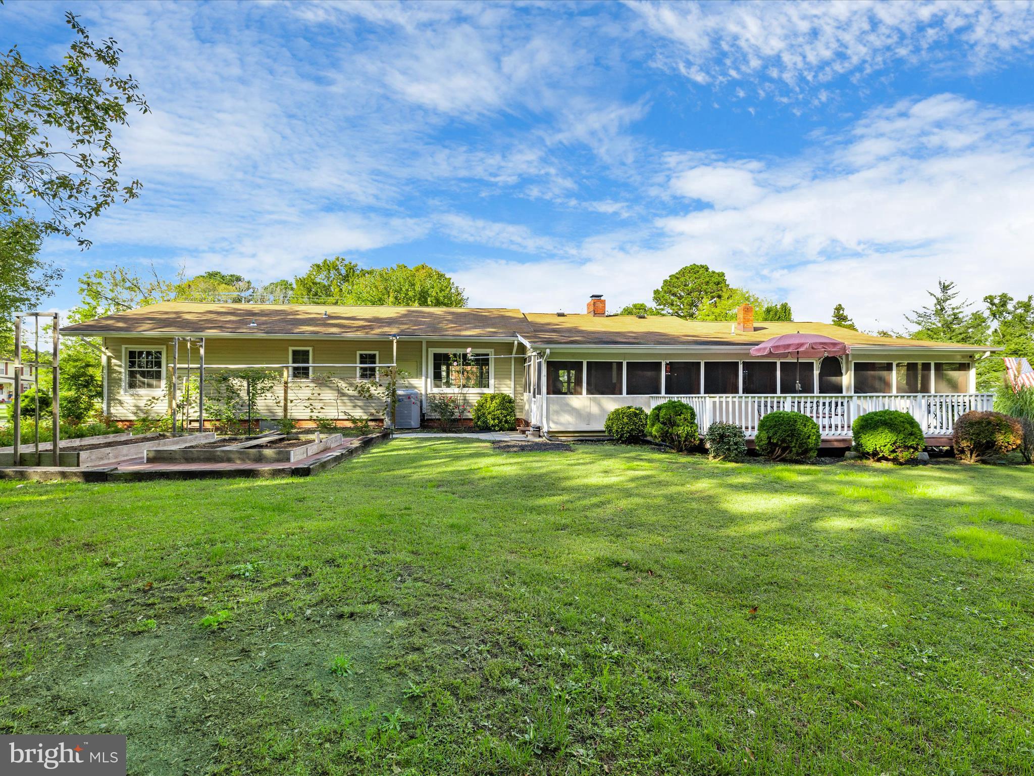 26905 Mt Vernon Road Princess Anne, MD 21853 - Photo 51 of 74 a front view of a house with a garden