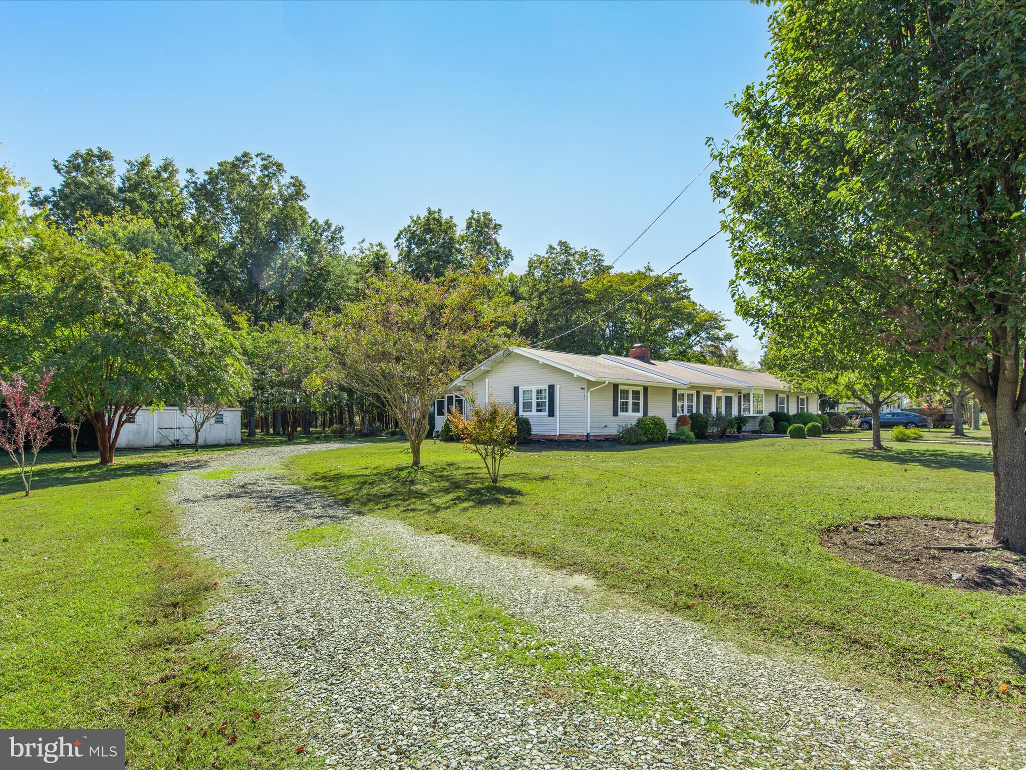 26905 Mt Vernon Road Princess Anne, MD 21853 - Photo 57 of 74 a view of a house with a yard and sitting area